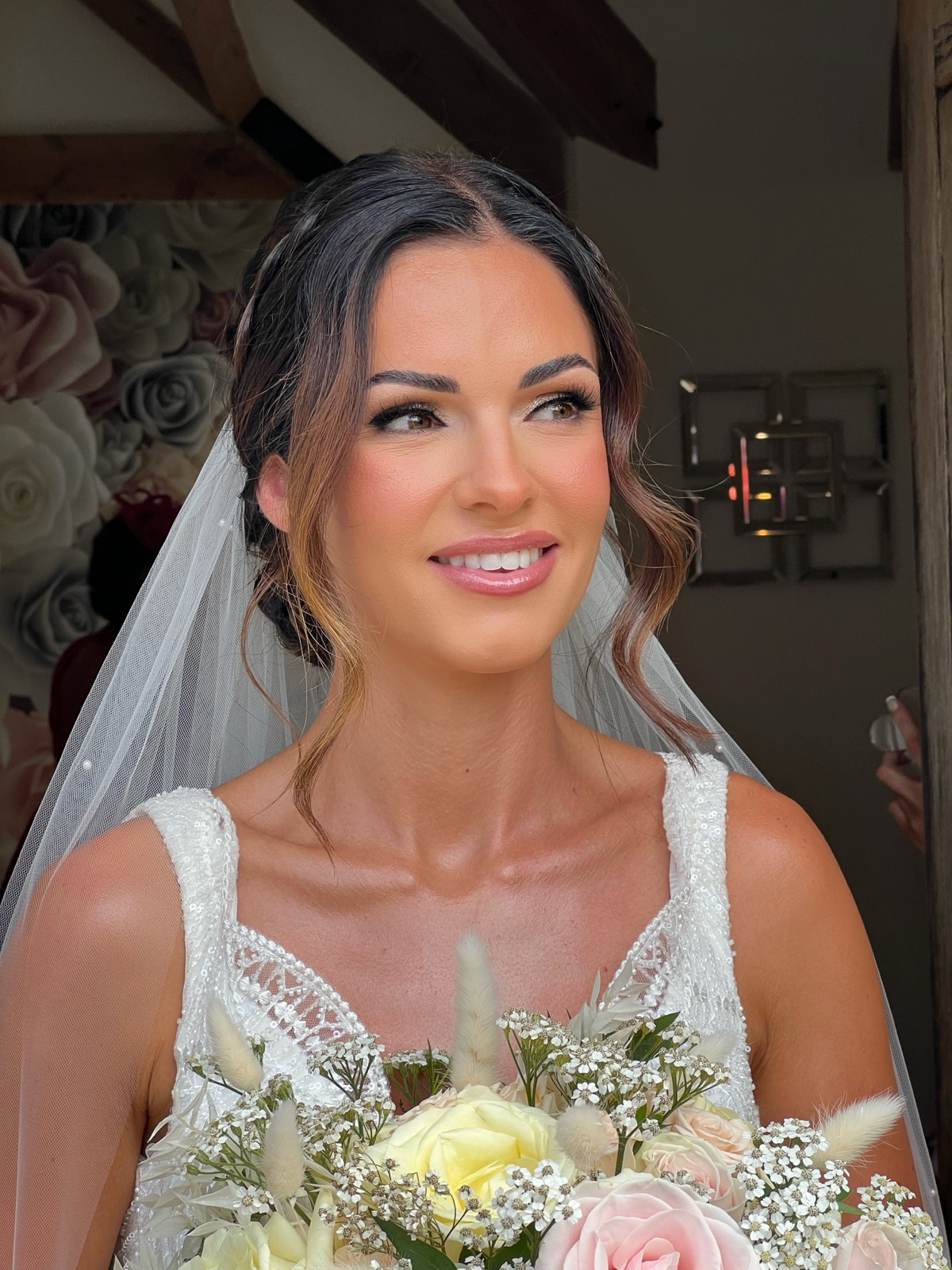 Bride with soft glam bridal makeup and veil